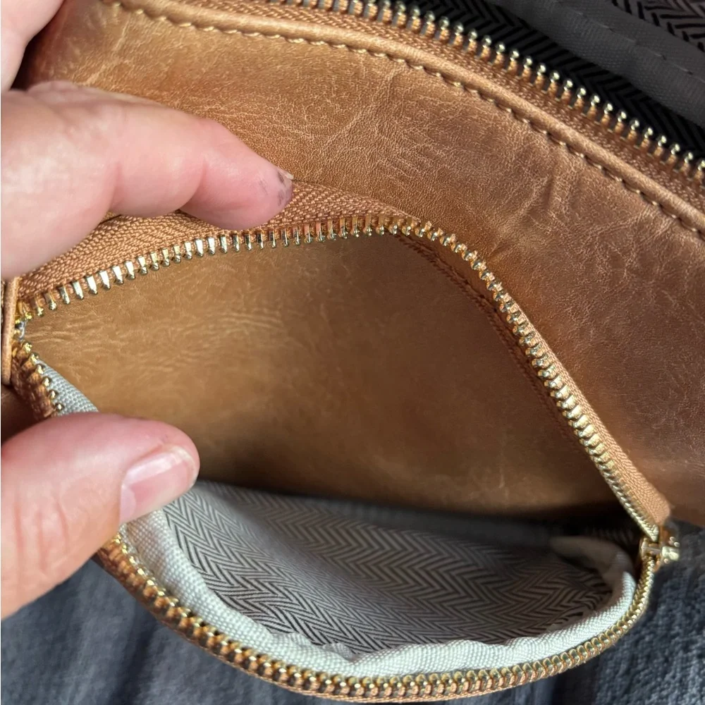 Brown Vegan Leather Sling‎ Bag with floral strap.